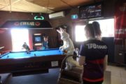 Easter Bunny supervises a pool game
